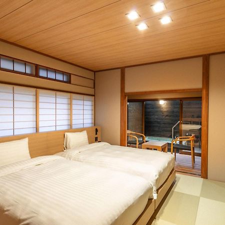源泉掛け流しの宿albergo湯楽 Yugawara Exterior foto